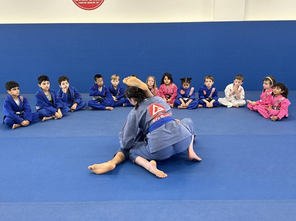 Coach teaching kids at Gracie Barra White Rock
